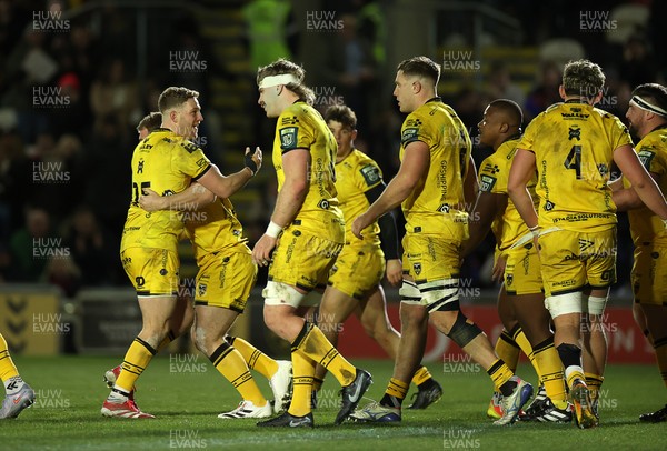 010126 - Dragons RFC v Scarlets - United Rugby Championship - George Roberts of Dragons celebrates scoring a try with Angus O'Brien
