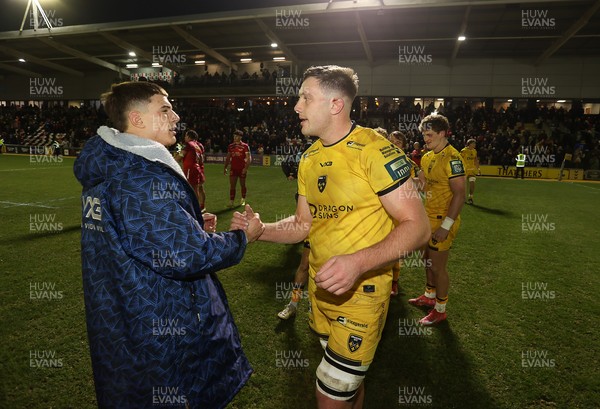 010126 - Dragons RFC v Scarlets - United Rugby Championship - Joe Hawkins and Ben Carter of Dragons at full time