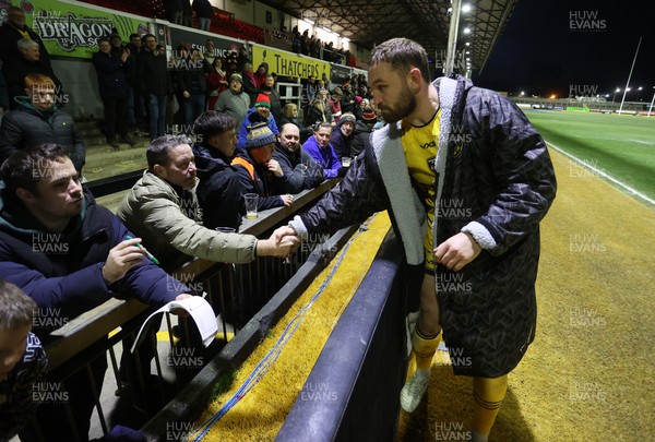 010126 - Dragons RFC v Scarlets - United Rugby Championship - Harri Keddie of Dragons with fans