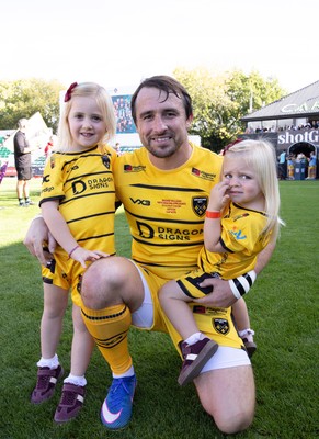 031026 Dragons RFC v Scarlets, BKT United Rugby Championship - Rhodri Williams runs out with his family on his 150 appearance for Dragons RFC