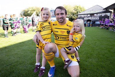 031026 Dragons RFC v Scarlets, BKT United Rugby Championship - Rhodri Williams runs out with his family on his 150 appearance for Dragons RFC