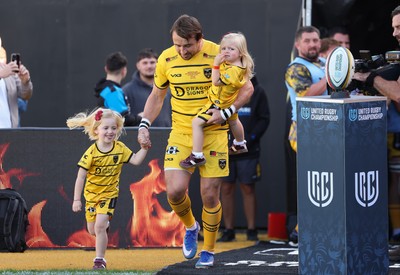 031026 Dragons RFC v Scarlets, BKT United Rugby Championship - Rhodri Williams runs out with his family on his 150 appearance for Dragons RFC