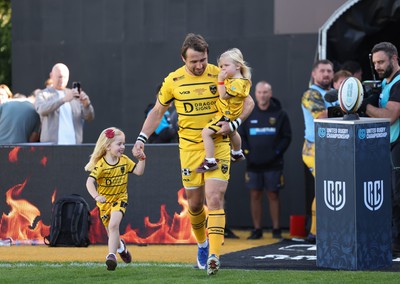 031026 Dragons RFC v Scarlets, BKT United Rugby Championship - Rhodri Williams runs out with his family on his 150 appearance for Dragons RFC