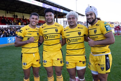 031026 Dragons RFC v Scarlets, BKT United Rugby Championship - Rio Dyer of Dragons RFC, Fetuli Paea of Dragons RFC, Fine Inisi of Dragons RFC and Anzelo Tuitavuki of Dragons RFC at the end of the match