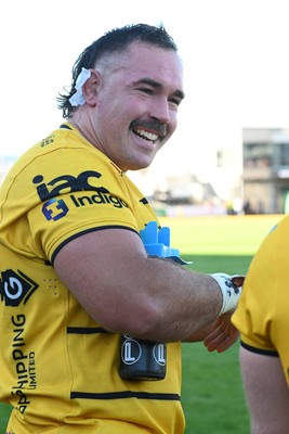 031026 - Dragons RFC v Scarlets - United Rugby Championship - Robert Hunt of Dragons celebrates at full time