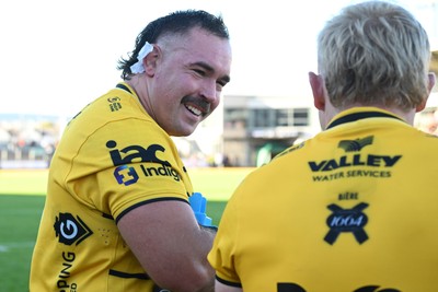 031026 - Dragons RFC v Scarlets - United Rugby Championship - Robert Hunt of Dragons celebrates at full time