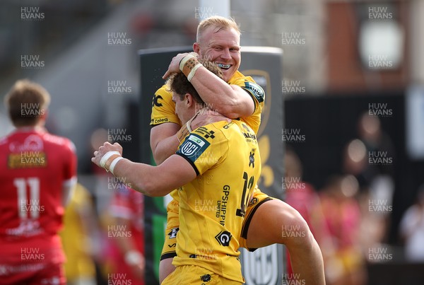 130925 - Dragons RFC v Scarlets - Pre Season Friendly - Joe Westwood of Dragons celebrates scoring a try with Tinus de Beer
