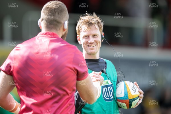 130925 - Dragons RFC v Scarlets - Preseason Friendly - Rhys Patchell of Dragons greets Jake Ball of Scarlets 