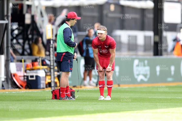 130925 - Dragons RFC v Scarlets - Preseason Friendly - Blair Murray of Scarlets receives treatment in the warm up