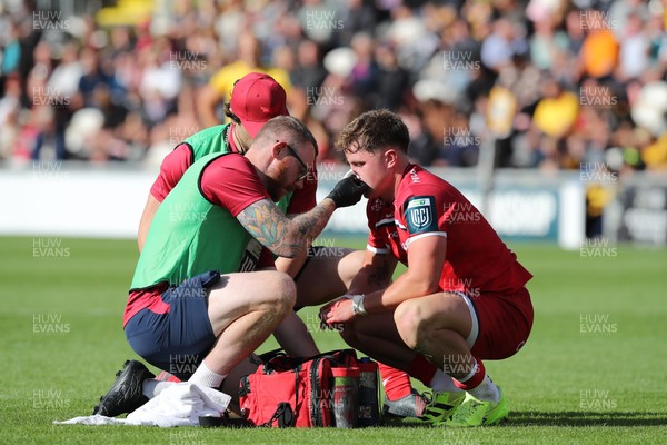 130925 - Dragons RFC v Scarlets - Preseason Friendly - Macs Page of Scarlets receives treatment for an injury 