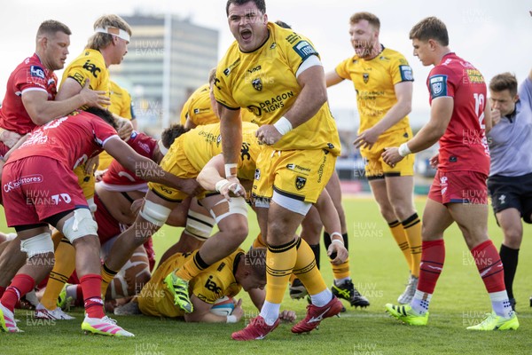 130925 - Dragons RFC v Scarlets - Preseason Friendly - Chris Coleman celebrates Harry Beddall of Dragons try 