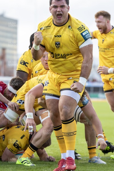 130925 - Dragons RFC v Scarlets - Preseason Friendly - Chris Coleman celebrates Harry Beddall of Dragons try 