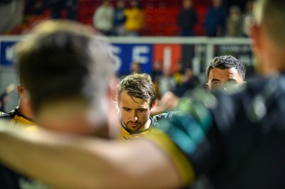 220325 - Dragons RFC v Ulster - United Rugby Championship - Rhrodri Willams of Dragons RFC in the team huddle after the match