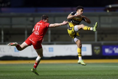 220325 - Dragons RFC v Ulster - United Rugby Championship - Rio Dyer of Dragons is challenged by Jacob Stockdale of Ulster 