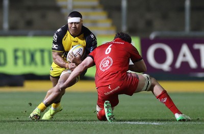 220325 - Dragons RFC v Ulster - United Rugby Championship - Paula Latu of Dragons is tackled by David McCann of Ulster 