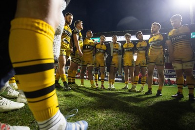 220325 - Dragons RFC v Ulster - United Rugby Championship - Dragons team huddle at full time