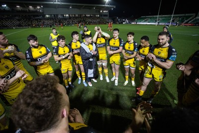 220325 - Dragons RFC v Ulster - United Rugby Championship - Dragons team huddle at full time