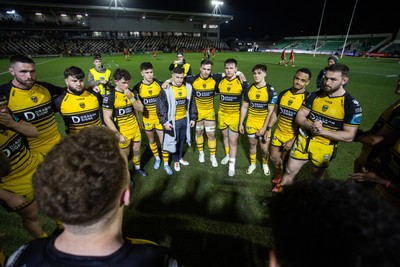 220325 - Dragons RFC v Ulster - United Rugby Championship - Dragons team huddle at full time