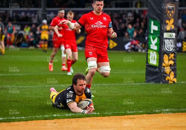 220325 - Dragons RFC v Ulster - United Rugby Championship - Rhodri Willams of Dragons RFC scores their third try of the game