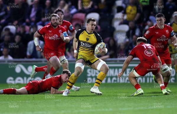 220325 - Dragons RFC v Ulster - United Rugby Championship - Taine Basham of Dragons makes a break