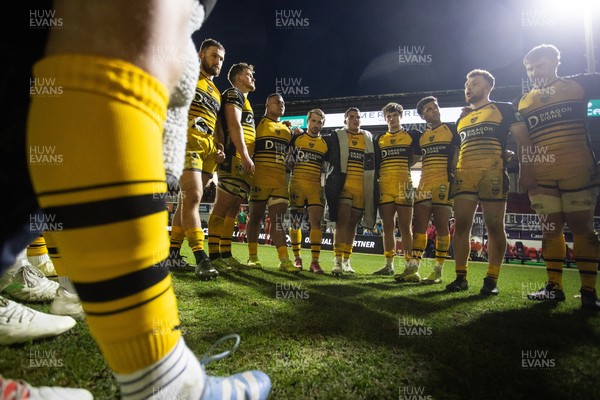 220325 - Dragons RFC v Ulster - United Rugby Championship - Dragons team huddle at full time