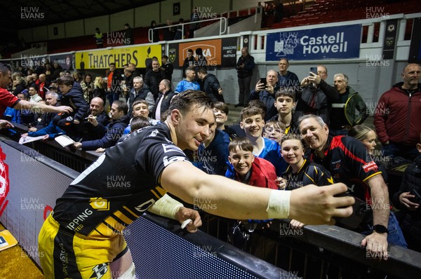 220325 - Dragons RFC v Ulster - United Rugby Championship - Taine Basham of Dragons with fans at full time