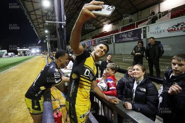 220325 - Dragons RFC v Ulster - United Rugby Championship - Rio Dyer of Dragons with fans at full time