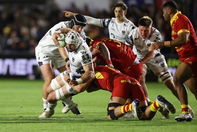 161026 - Dragons RFC v USA Perpignan - European Rugby Challenge Cup - Harri Keddie of Dragons is tackled by Jaco van Tonder of Perpignan 