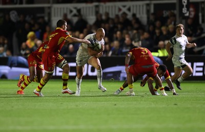 161026 - Dragons RFC v USA Perpignan - European Rugby Challenge Cup - Jared Rosser of Dragons is tackled by Marco Riccioni of Perpignan 