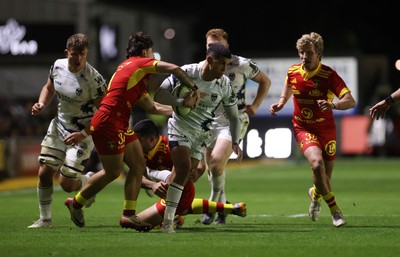 161026 - Dragons RFC v USA Perpignan - European Rugby Challenge Cup - Rio Dyer of Dragons is tackled by Maxim Granell of Perpignan 