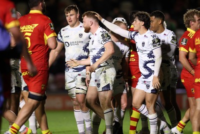 161026 - Dragons RFC v USA Perpignan - European Rugby Challenge Cup - Aneurin Owen of Dragons celebrates scoring a try with team mates