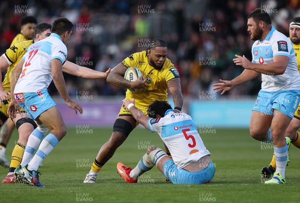170426 - Dragons v Vodacom Bulls - United Rugby Championship - Levi Douglas of Dragons is tackled by Ruan Nortje of Bulls 