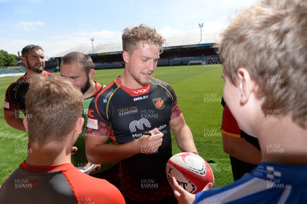 070818 - Dragons Rugby Training - Tyler Morgan meets fans after training
