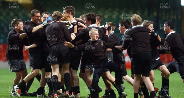 290403 - Whitchurch v Ystalyfera - Coca Cola U14 Dragons Rugby Cup Final - Whitchurch players celebrate including Ben Warburton (second in from left) 