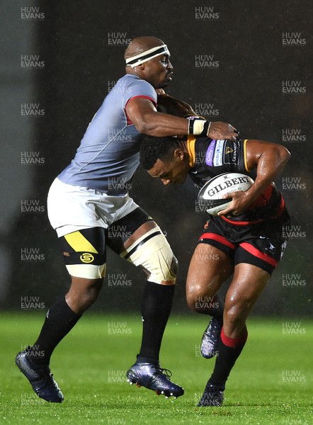 300917 - Dragons Rugby v Southern Kings - Guinness PRO14 - Ashton Hewitt of Dragons is tackled by Andisa Ntsila of Southern Kings