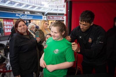 200218 - Dragons players Gavin Henson and Dorian Jones sign items and pose for photographs for fans at Festival Park, Ebbw Vale