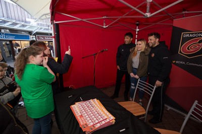 200218 - Dragons players Gavin Henson and Dorian Jones sign items and pose for photographs for fans at Festival Park, Ebbw Vale