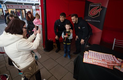 200218 - Dragons players Gavin Henson and Dorian Jones sign items and pose for photographs for fans at Festival Park, Ebbw Vale