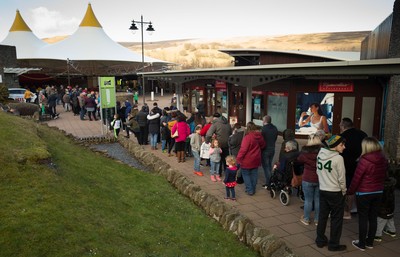 200218 - Crowds wait to meet Dragons players Gavin Henson and Dorian Jones as they sign items and pose for photographs for fans at Festival Park, Ebbw Vale