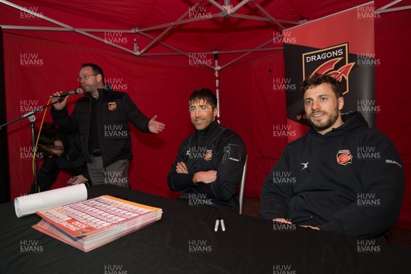 200218 - Dragons players Gavin Henson and Dorian Jones sign items and pose for photographs for fans at Festival Park, Ebbw Vale