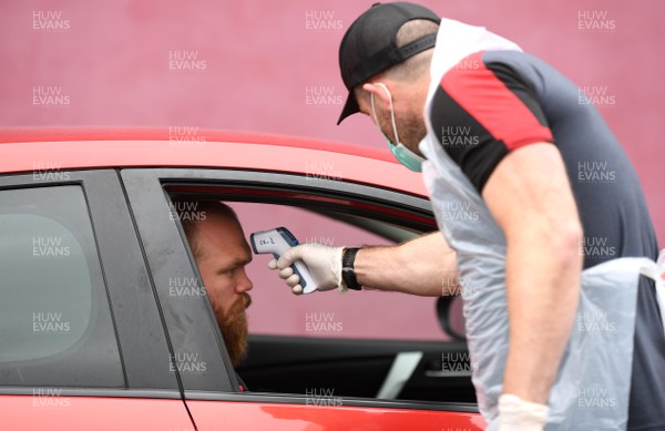 070720 - Dragons Rugby Training - Joseph Davies has his temperature taken as he arrives for training