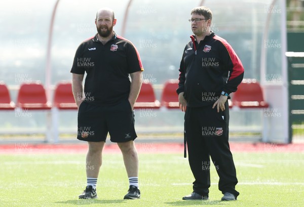 010419 - Dragons Training Session - James Chapron, right, with head coach Ceri Jones during training session ahead of travelling to South Africa