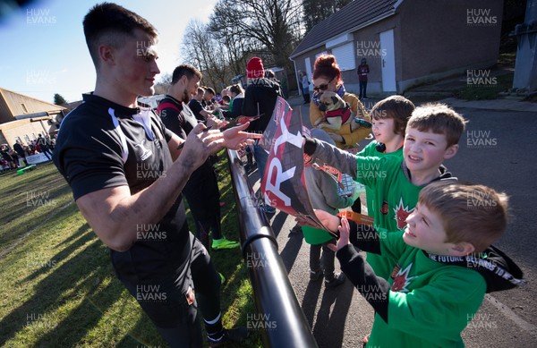200218 - Dragons Public Training Session, Ebbw Vale - The Dragons players sign autographs for fans after an open training session at Eugene Cross Park, Ebbw Vale, ahead of their Guinness PRO14 match against Edinburgh which will take place at the ground