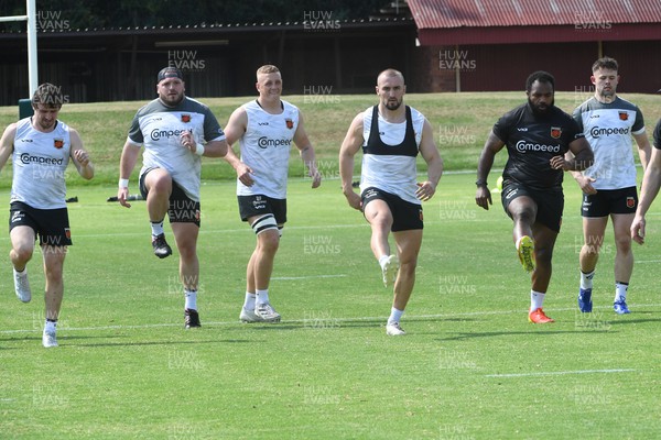 240322 - Dragons Rugby Training at Pretoria Boys High School - Left to right, Rhodri Williams, Greg Bateman, Ben Fry, Ollie Griffiths, Mesake Doge and Ioan Davies during a Dragons training session in South Africa