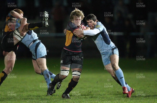 04.11.09 Gwent Dragons U18s v Blues U18s, Regional Age Grade Championship -  Dragons Jamie Sollis is tackled by Blues Thomas Pascoe 