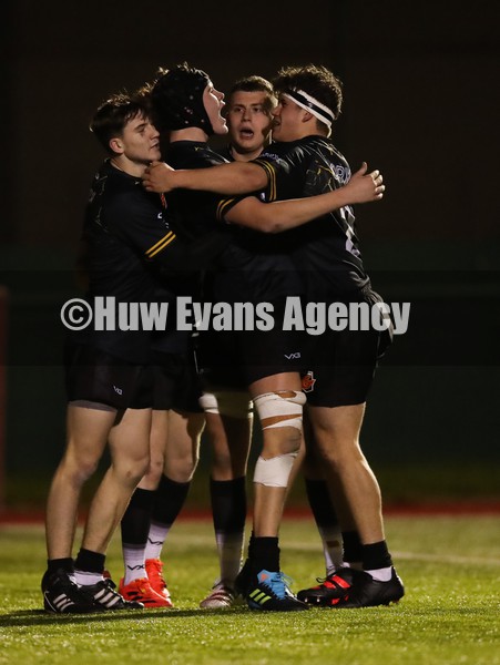 260122 - Dragons U18 v Ospreys U18, Regional Age Grade Championship - Nick Thomas of Dragons celebrates with team mates after he dives in to score try