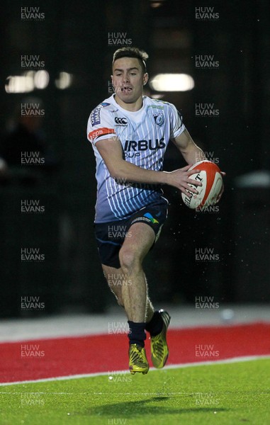 121114 - Newport Gwent Dragons U18s v Cardiff Blues U18s - Curtis Povey gets past the Dragons defence