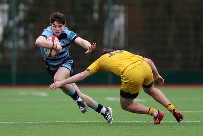 080226 - Dragons U18s v Cardiff U18s - Regional Age Grade - Evan Jones of Cardiff is tackled by Ryley Fussell of Dragons 