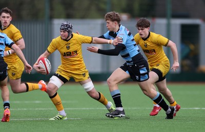 080226 - Dragons U18s v Cardiff U18s - Regional Age Grade - Jake Leighton of Dragons is tackled by Finn Britton of Cardiff 