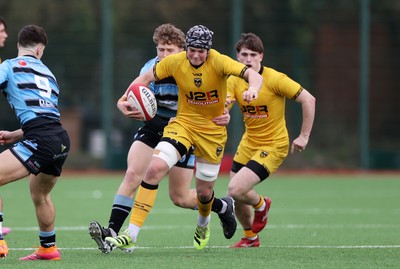 080226 - Dragons U18s v Cardiff U18s - Regional Age Grade - Jake Leighton of Dragons is tackled by Finn Britton of Cardiff 